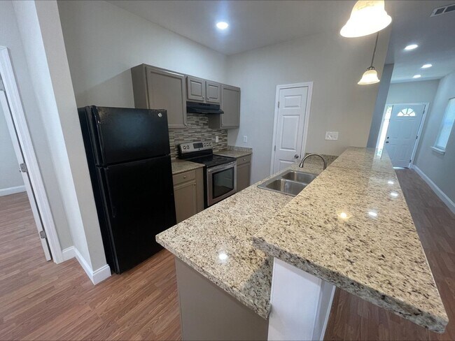 Photo - Beautifully remodeled, three bedroom, one ...