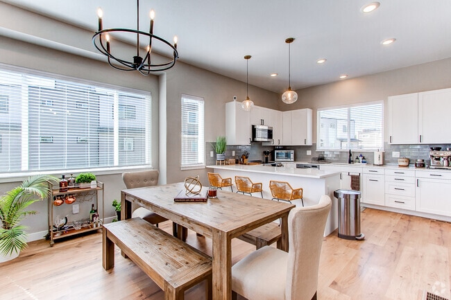 Open-concept dining room and kitchen - 8500 W 62nd Ave Rental