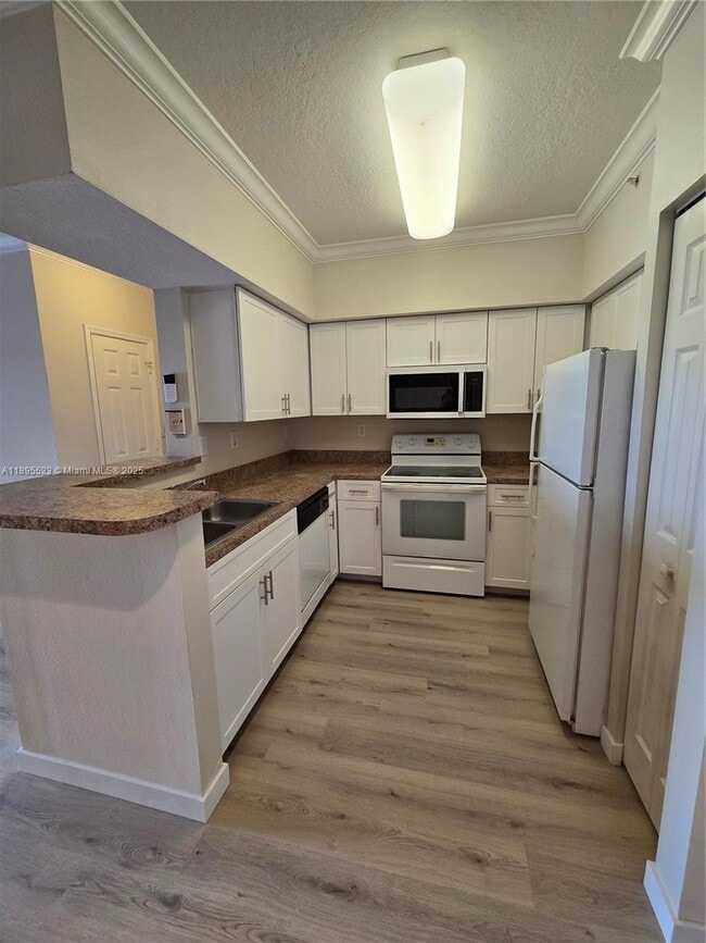 Photo - 11630 SW 2nd St Unit 17306