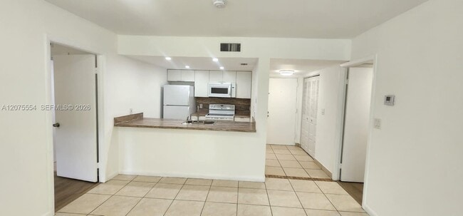 Photo - 8160 Geneva Ct Unit 104