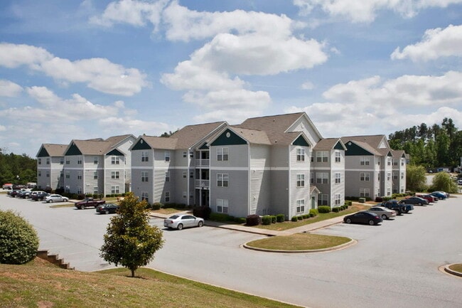 Building Photo - "Charming 1-Bedroom Townhouse Retreat on Campus Drive!"