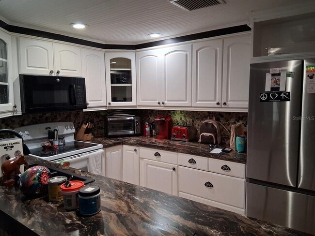 Photo - 12213 Saddle Strap Row