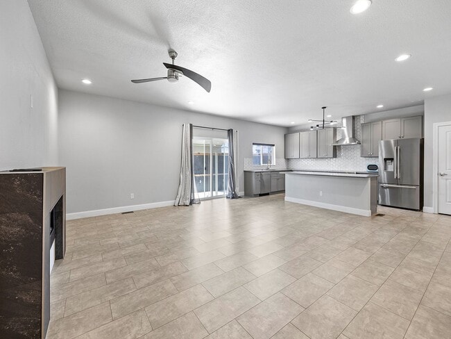 Photo - 4-Bedroom Townhome with Finished Basement, Garage & Private Outdoor Space