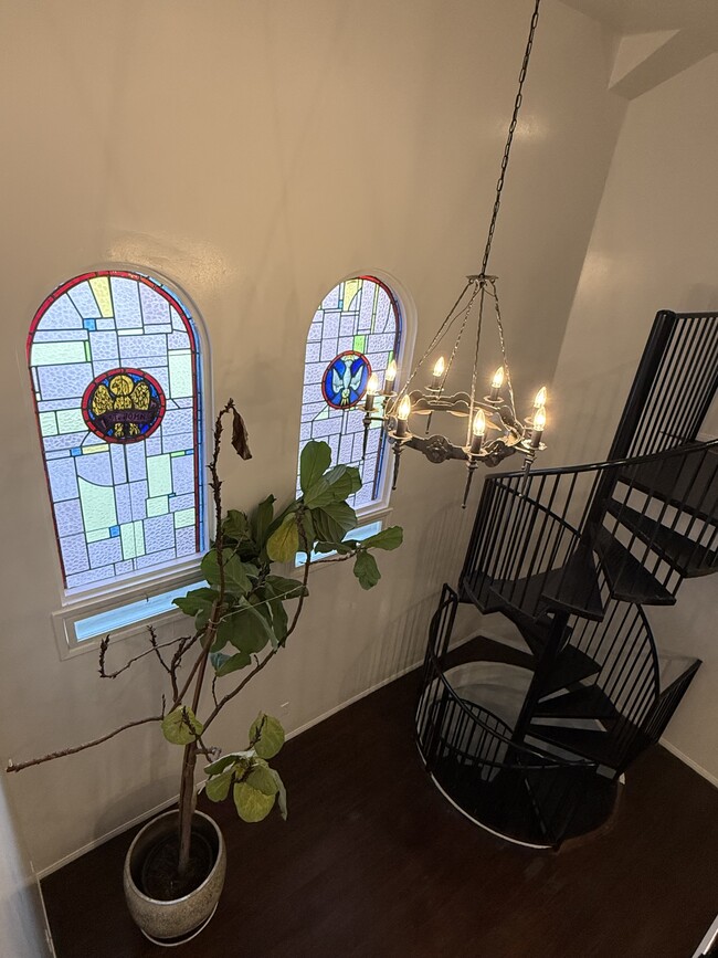 View of stain glass windows from Loft/2nd Bedroom - 900 N Hoover Apartments