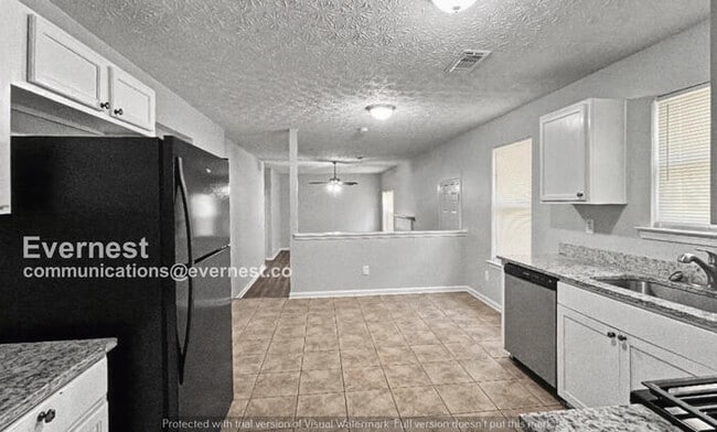 Photo - 3 Bed, 2 Bath Home with Fenced Yard & Garage / Pet-Friendly / Available Now!