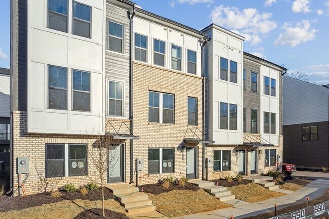 Photo - High-End 2BR Townhome | Rooftop Terrace + 2-Car Garage | 24-Unit Community