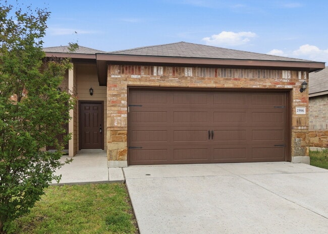 Building Photo - 3 Bedroom Duplex with Stained Concrete Floors and Greenbelt Views!