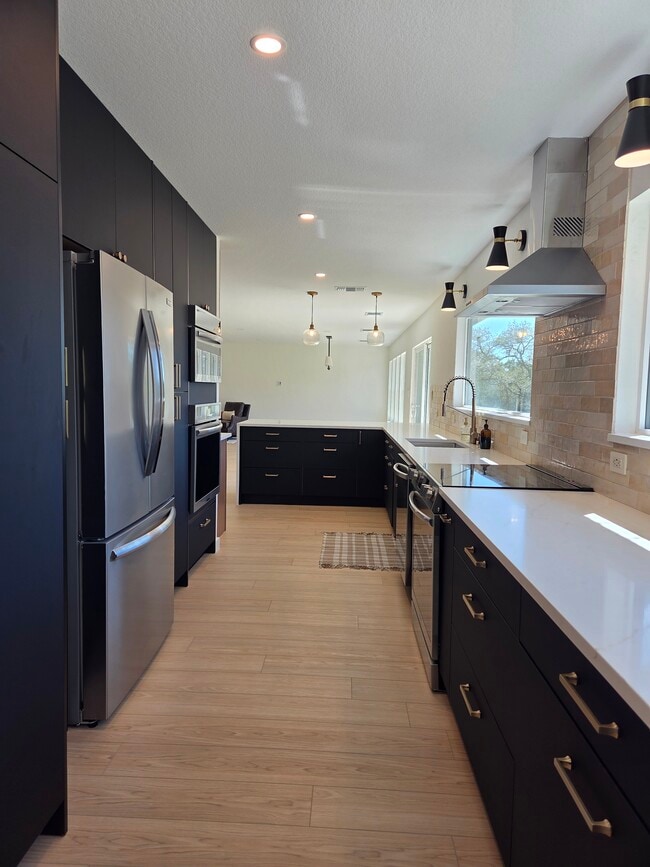 Main Kitchen Open to Dining Rm - 10717 Deer Canyon Rd