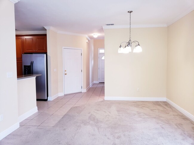 Photo - 3 bedroom town home for rent early January 2026, gated community with a garage for $1725 per month