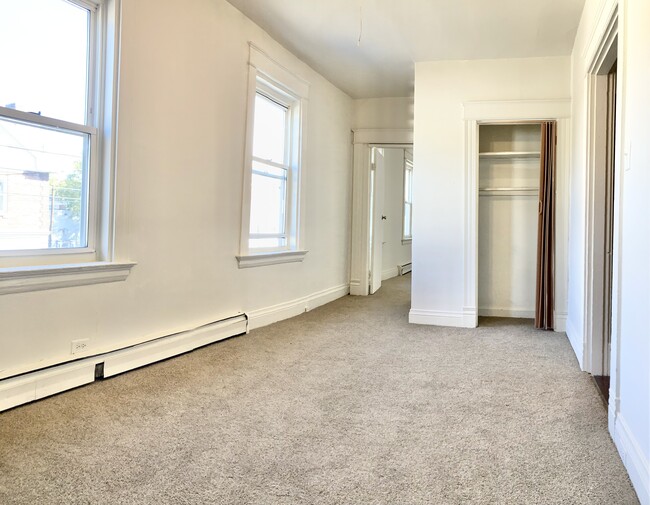 Living Room - 5201 Hunter Ave Apartments Unit #3