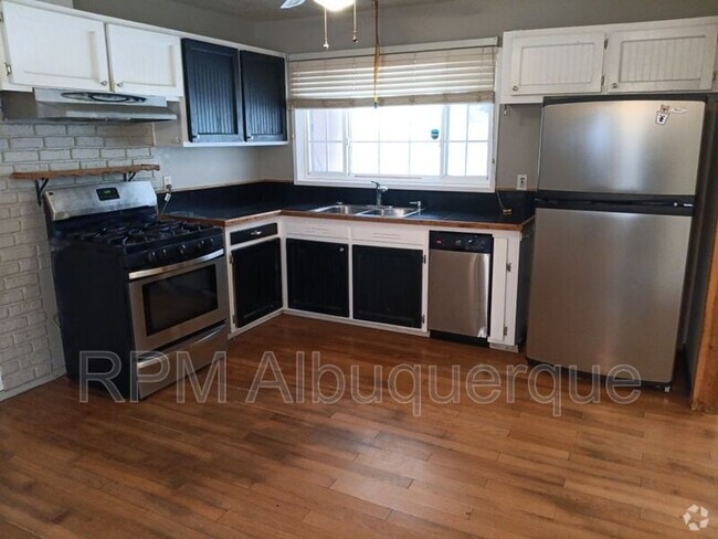 Building Photo - 7901 Hannett Ave NE Rental