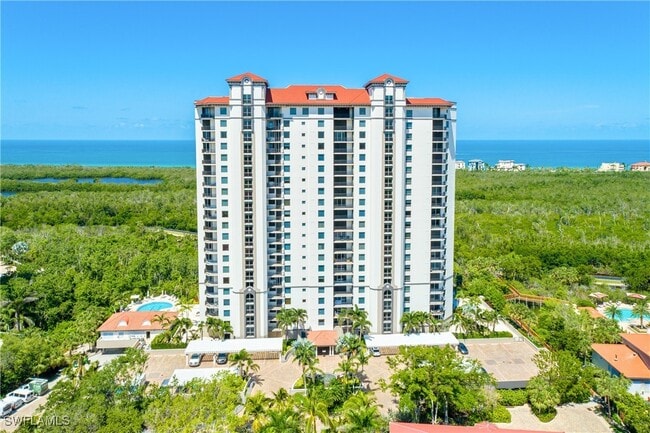 Building Photo - 7225 Pelican Bay Blvd Unit 204