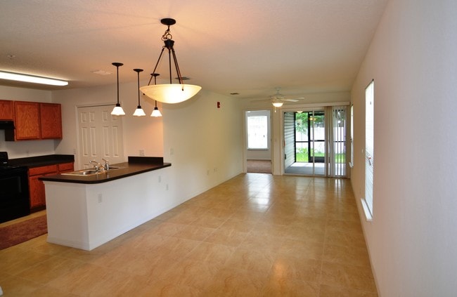 Patio Home Living Room/Dining Building Photo - Spring Tree Village