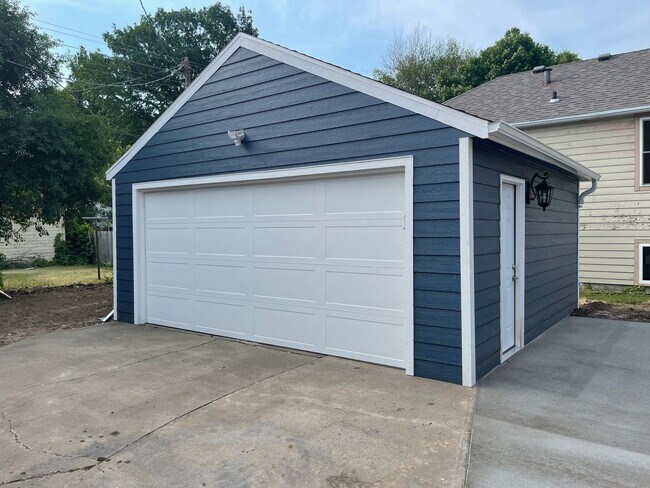 Photo - One block from USF! Huge home with 4 bedrooms! Fenced in yard