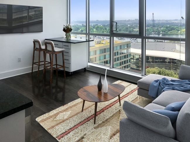 One Bedroom Apartment Kitchen and Living Area at The Lex - Lex and Leo at Waterfront Station Apartments