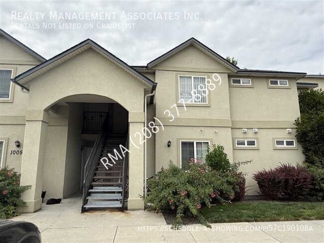 Building Photo - 10054 W Garverdale Ln Unit 202