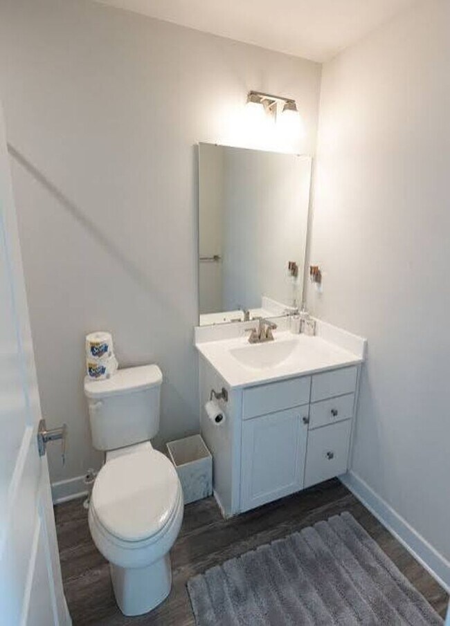 Photo - Available Now! Discover urban living at its finest in this 4-level gem!