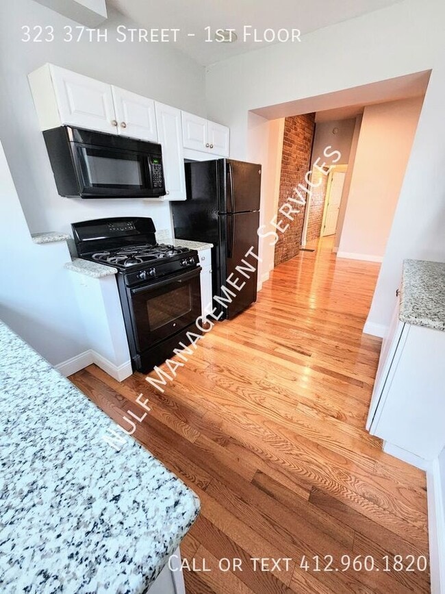 Photo - 323 37th St Unidad 1st Floor