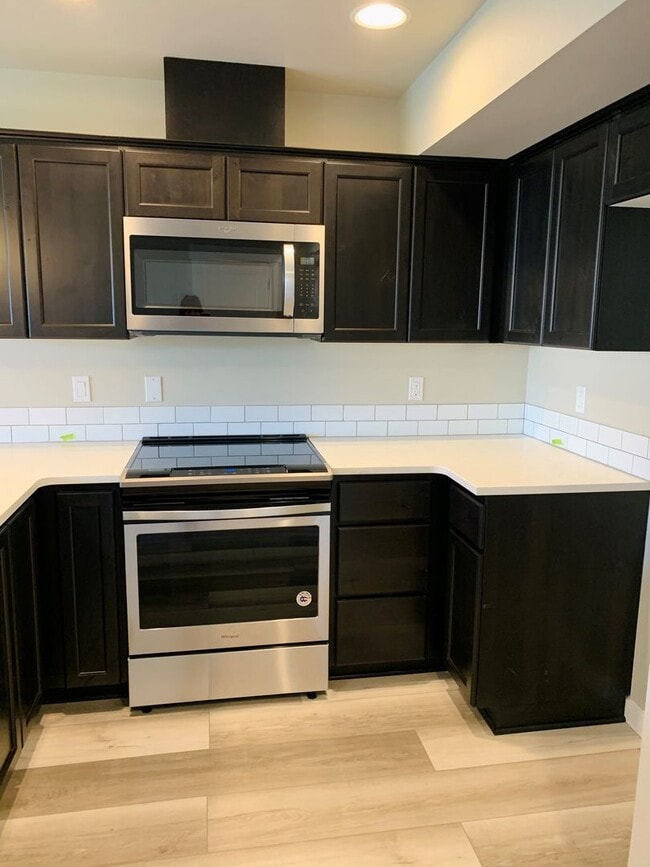 Photo - Whether you just want the extra room or need it for your family, our townhomes are calling!!