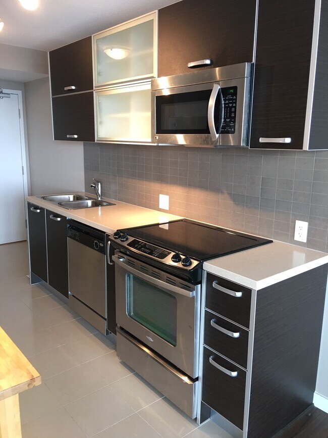 Photo - 9981 Whalley Blvd Unit 1205
