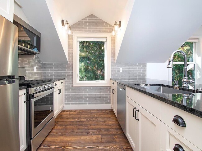 Photo - Expansive Loft-Style Carriage House in Private Haller Lake Estate