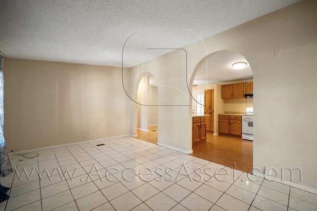 Photo - Charming 4 Bed/2.5 Bath Home With Spacious Backyard And Gated Entrance!