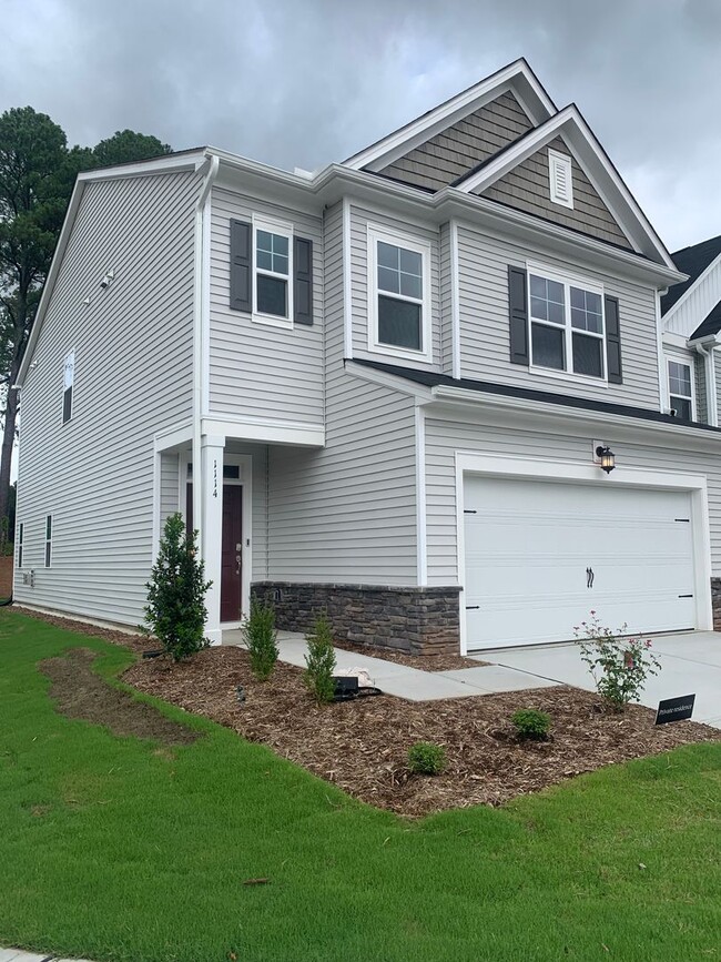 Photo - BRAND NEW TOWNHOME! 2 CAR GARAGE. SCREENED...