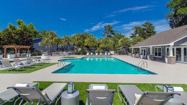 Whether you're seeking a quiet day of relaxation or a lively gathering with friends, this poolside haven caters to every mood. - Emerson Isles Apartments