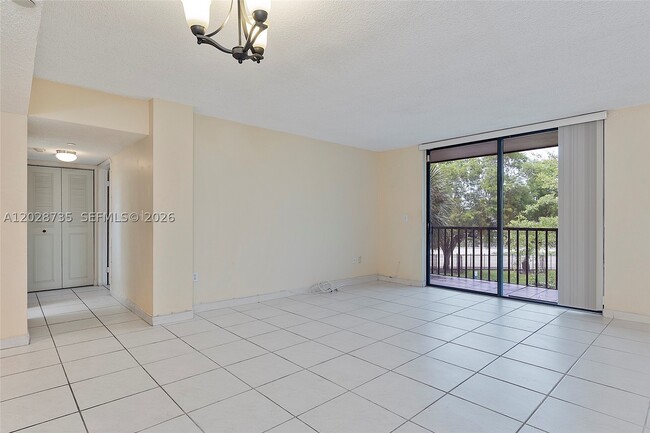 Building Photo - 8760 SW 133rd Ave Unit 301