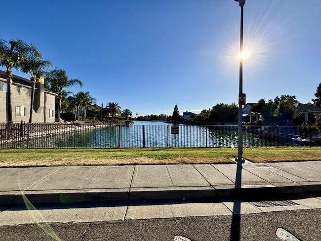 Lake views from your front yard, corner lot, shopping just blocks away and a beautiful place to c...
