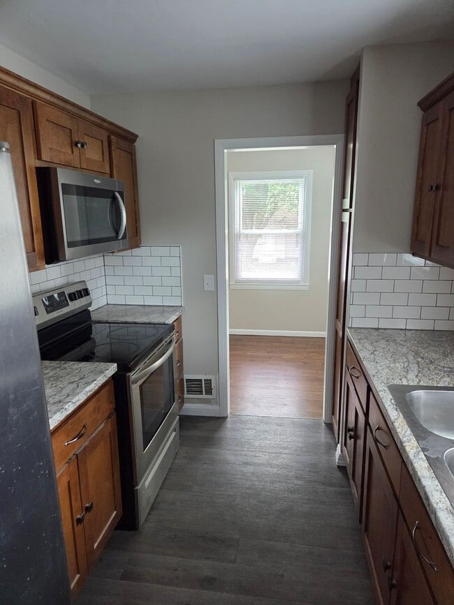 Photo - Newly remodeled 3/1/1 with fenced in backyard!