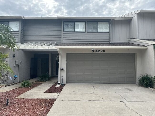 Building Photo - CARROLLWOOD VILLAGE REMODELED TOWNHOUSE