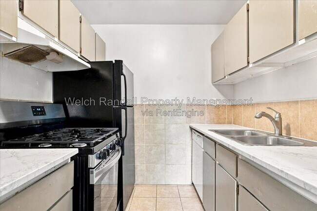 Photo - 5511 S Willow Ln Unit F