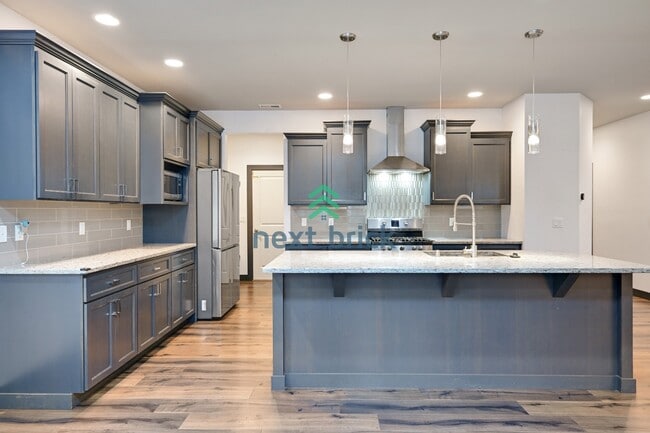 Photo - Stunning 3 Beds and 3 Bath Single Family with additional office space and entertainment room read...