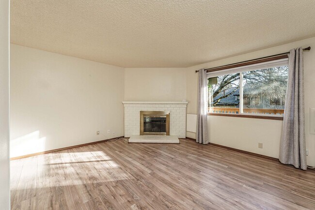 Photo - Updated 1 Bed / 1 Bath Upper-Level Condo with Balcony, Garage & A/C — Gated Community! Unit 32