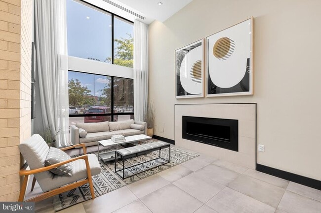 Building Photo - 1628 11th St NW Unit 208