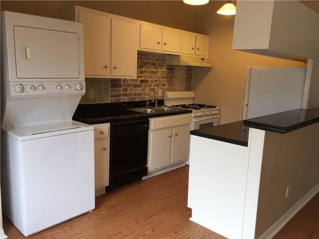 Photo - UPGRADED 1 BED WASHER AND DRYER IN UNIT Unit #104