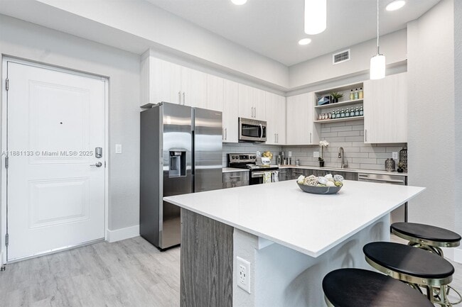 Building Photo - 9155 NW 57th St Unit 103 Rental