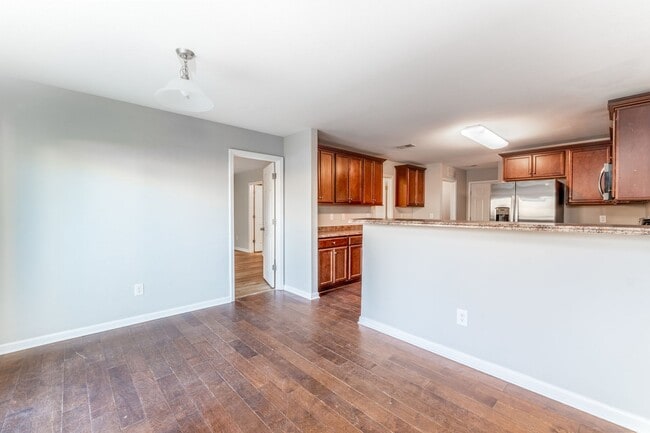 Photo - Spacious 5-Bed, 3.5-Bath Residence with 4,003 Sqft, Master on 1st Floor, Elegant Design, & Versat...