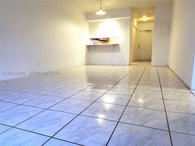 Building Photo - 6580 Santona St Unit A26
