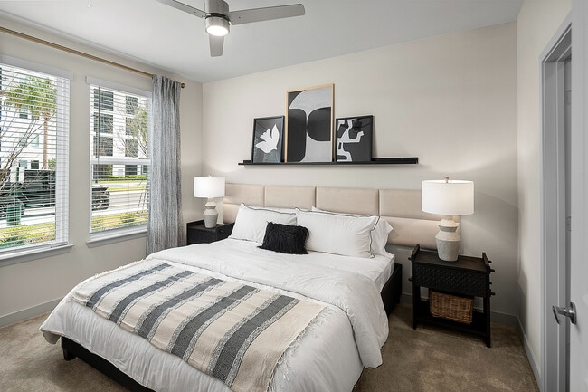 Cozy Primary Bedroom with Large Windows