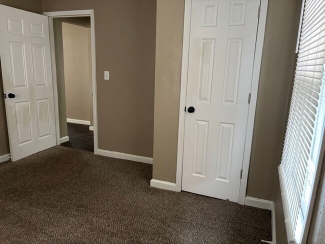 Photo - “Move-In Ready 2-Bedroom with Expansive Privacy Yard”