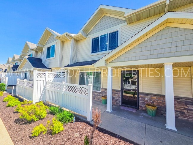 Building Photo - 3-Bedroom, 2.5-Bath End-Unit Townhome in West Des Moines with Attached 2-Car Garage