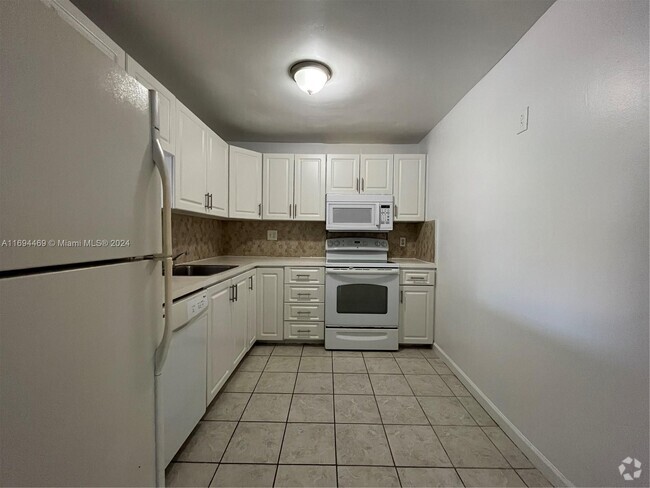 Building Photo - 4334 NW 9th Ave Unit 9-2H Rental