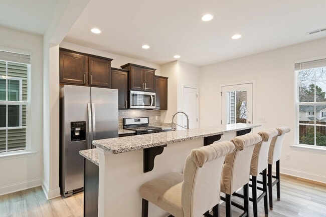 Photo - Stylish and Spacious 3 Bedroom, 2.5 Bathroom End-Unit Townhome w/ Garage!