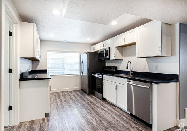 Building Photo - 6720 W 3210 S Unit Basement Apartment