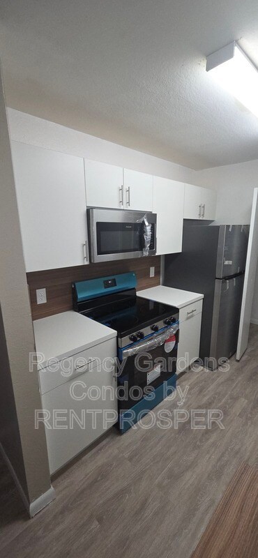 Photo - 5540 Devonbriar Way Unit 103