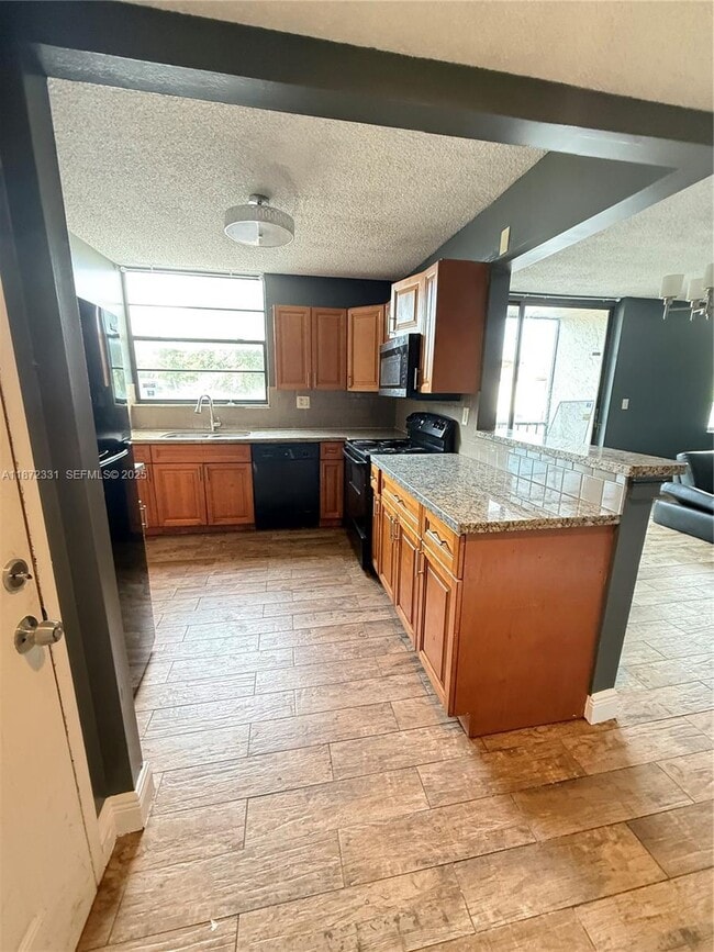 Building Photo - 1798 NW 55th Ave Unit 203