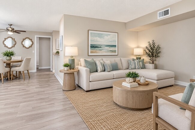 Elevate your lifestyle at Club Lake Pointe with this spacious living area featuring modern finishes, natural light, and a cozy atmosphere. Perfect for relaxation and entertaining, it’s time to make this space your own. Schedule a tour today!
