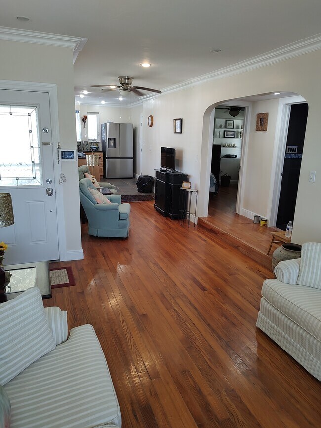 View of Living Room into TV Room and Kitchen - 3601 Alabama Ave NE Unit 3601